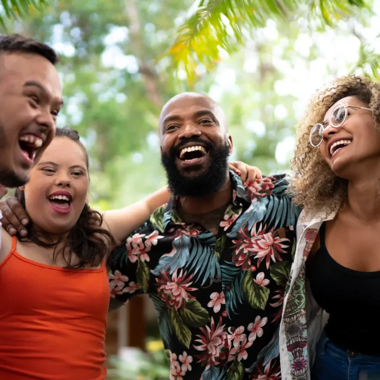 Community people hugging and laughing